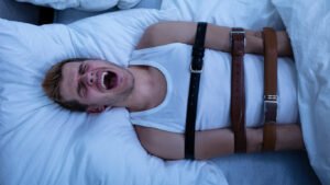 What is sleep paralysis?